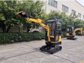 In what terrain conditions is the small excavator suitable for use?